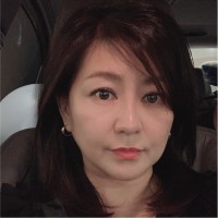Huttons Real Estate Group Employee Della Tan's profile photo