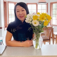 Community Network Employee Jun Wang's profile photo