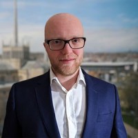 Personnel Checks Employee Simon Henderson's profile photo