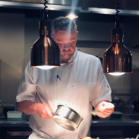 Behind Restaurant Employee James Beard's profile photo