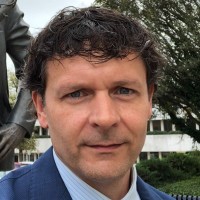 James Wickersham Email & Phone Number