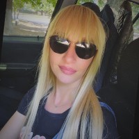 AlphaGrowth Employee Oksana Vlasenko's profile photo
