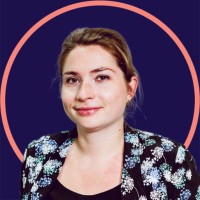 B.Between Employee Melanie Blandin's profile photo