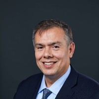 Booking Holdings (NASDAQ: BKNG) Employee John Herrera's profile photo