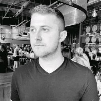 Left Main REI Employee Brandon Thomas's profile photo