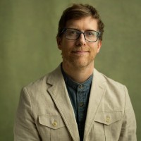 Community Refugee and Immigration Services Employee Jeremy Hollon's profile photo