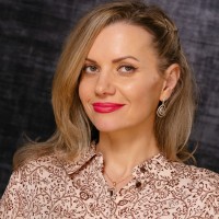 Oximio Employee Olena Hutchison's profile photo