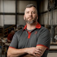T8 Exhibits Employee Le Tate's profile photo