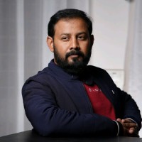 Suman R