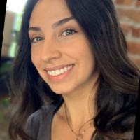 Seated Employee Angela Dale's profile photo