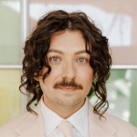 Educated Mess Employee Justin Guevara's profile photo