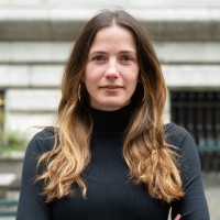With Intelligence Employee Eva Thomas's profile photo
