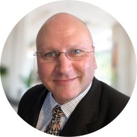 Reveal Employee John Bassi's profile photo