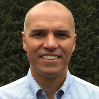Father Bill's & MainSpring Employee Genipro Almeida's profile photo