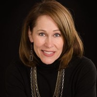 Tweak Employee SueAnn Heim's profile photo