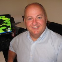 Looking Employee Reggie Walker's profile photo