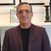 Related Management Company Employee Qemal Agalliu's profile photo