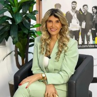 Foreground. Employee Dalia Ayache's profile photo