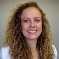 Junto Seguros Employee Flavia Oliveira's profile photo