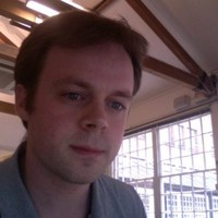 Juno Employee Alex Tomlins's profile photo