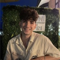 Dark Green PR Employee Cristian Sutton's profile photo