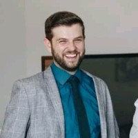 Neighbors Bank Employee Guy Domino's profile photo
