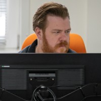 Create IT Employee Andrew Smith's profile photo