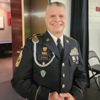 Christopher Derusha Email & Phone Number