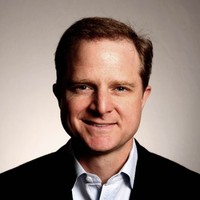 On Employee Dennis Durkin's profile photo