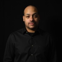 SurgeStreams Employee Asim Robinson's profile photo