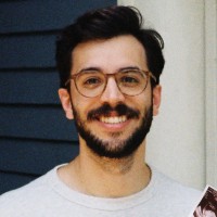 Thoughtful AI Employee Thiago Carvalho's profile photo