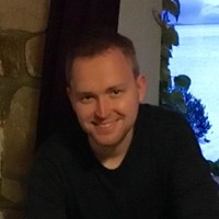 Seated Employee John Griffin's profile photo