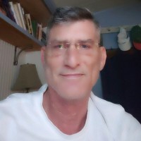Looking Employee Maynard Hartman's profile photo