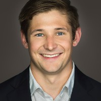 FIG. 1 Employee Jack McGinnity's profile photo