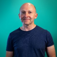 &above Employee Tim Johnson's profile photo