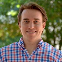 Suited Employee Aaron Myers's profile photo