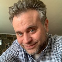 Small Loan Studio Employee Robert Corra's profile photo
