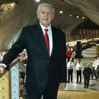 Tanju Özalpay Email