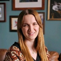 FIG. 1 Employee Hallie Touchstone's profile photo