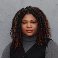 Necessary Behavior Employee Brittany Oshiyoye's profile photo